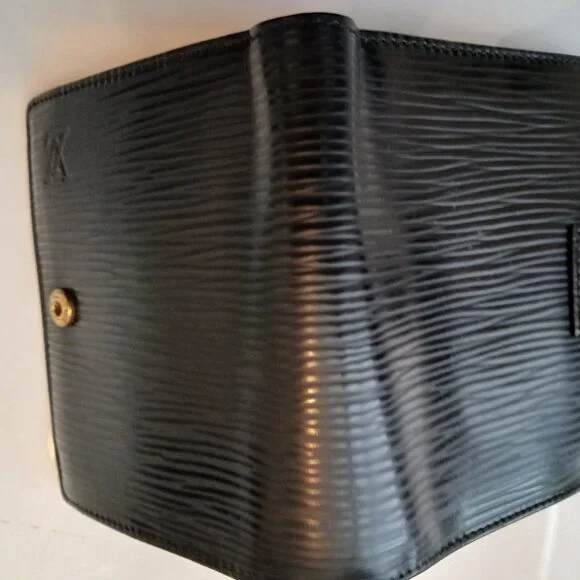 Louis Vuitton bifold .en's wallet Wallets